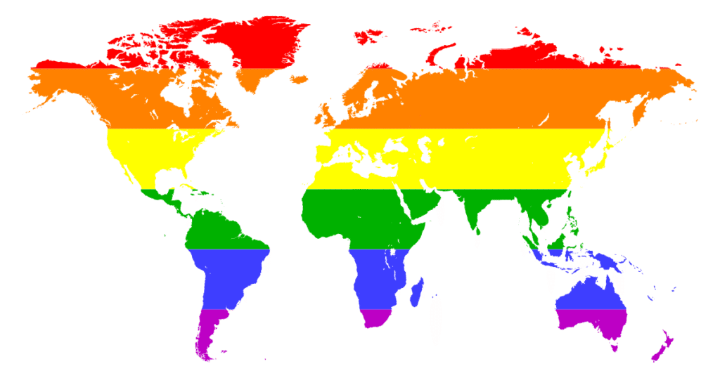 Mapa del mundo con los continentes representados por los colores del arcoíris LGTBI+.