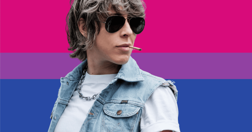 Persona bisexual con expresión seria, delante de un fondo con los colores de la bandera bisexual, simbolizando la lucha por el reconocimiento.